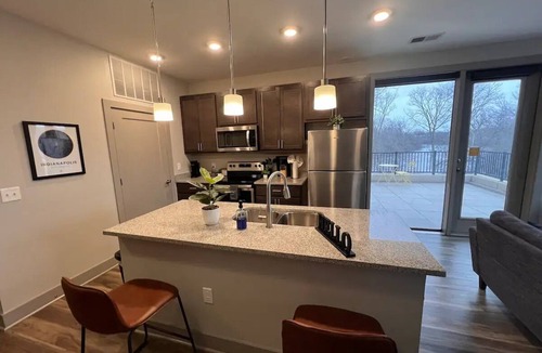 Broad Ripple Apartment | River Views & Monon Trail Steps Away: Chic Oasis