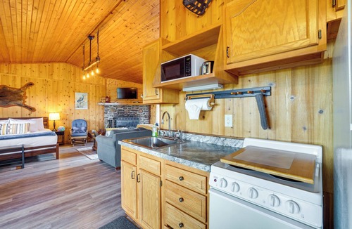 Berryville Cabin | Riverfront Berryville Retreat w/Fire Pit & BBQ!