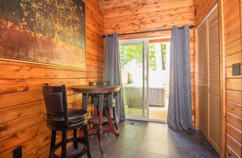 Paris House | Riverfront Blufftop Escape | Hot Tub, Deck, Fireplace, Kayaks, Tubes & Firepit