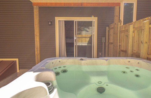 Paris House | Riverfront Blufftop Escape | Hot Tub, Deck, Fireplace, Kayaks, Tubes & Firepit