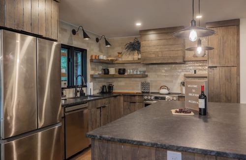 Cherry Log Cabin | Riverfront Cabin, Game Room, Hot Tub, Fire Pit! Only 10 mins from Downtown BR!