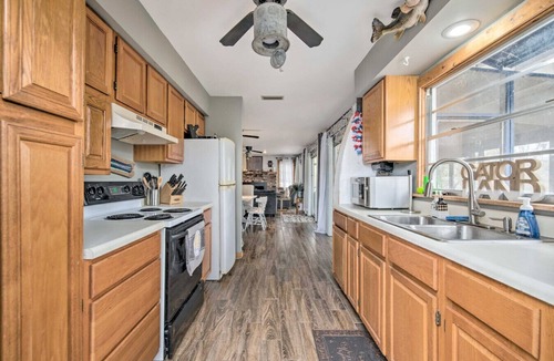 Bushnell Cabin | Riverfront Cabin w Screened Patio & Fire Pit!
