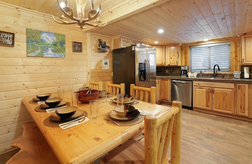 Sunriver Cabin | Riverfront Cabin w/Trails, Hot Tub, Wood Stove, AC & River Views + dogs OK