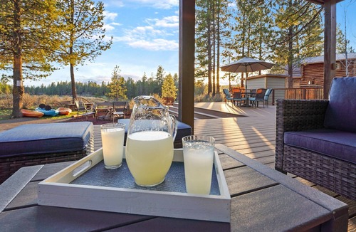 Sunriver Cabin | Riverfront Cabin w/Trails, Hot Tub, Wood Stove, AC & River Views + dogs OK