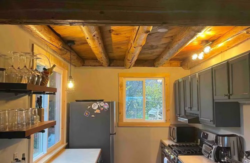 East Haven Cabin | Riverfront Cabin with Burke Mountain Views