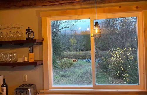 East Haven Cabin | Riverfront Cabin with Burke Mountain Views