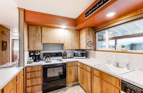 Joseph Cabin | Riverfront cabin with large yard, great deck, & fireplace