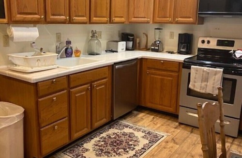 Colton Cottage | Riverfront Cottage with Dock, Screened Porch and View