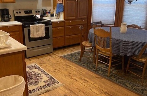 Colton Cottage | Riverfront Cottage with Dock, Screened Porch and View