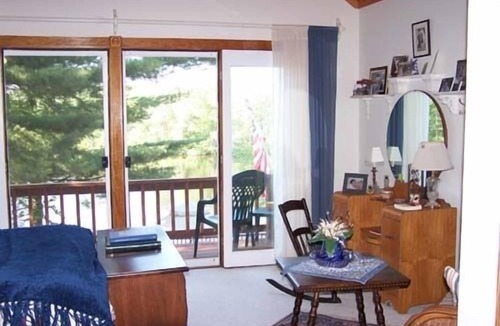 Colton Cottage | Riverfront Cottage with Dock, Screened Porch and View