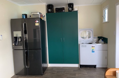 Te Kopuru House | Riverfront Family Home, with spa and stage