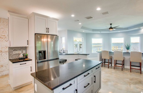 Iona House | Riverfront Fort Myers Luxury Home w/Heated Pool!