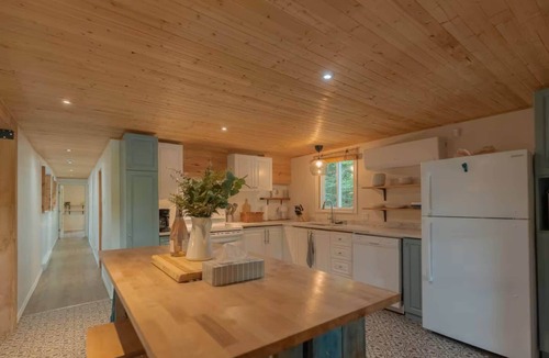 Brebeuf Ski Chalet | Riverfront Getaway with Hot Tub and Scenic Views