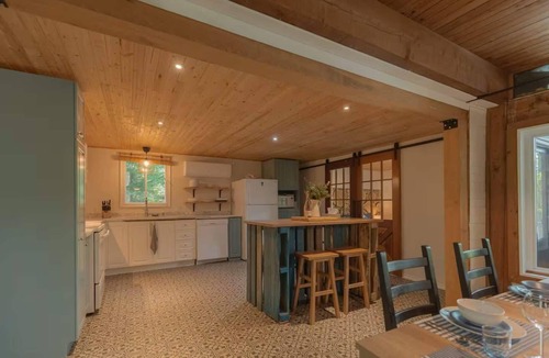Brebeuf Ski Chalet | Riverfront Getaway with Hot Tub and Scenic Views