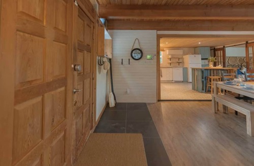 Brebeuf Ski Chalet | Riverfront Getaway with Hot Tub and Scenic Views