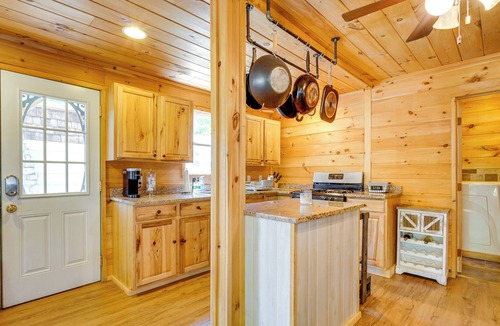 Lake Luzerne-Hadley Cabin | Riverfront Hadley Getaway w/ Fire Pit & Boat Dock!