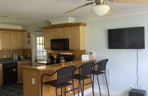 Sebastian Cottage | Riverfront home with a boat dock, WiFi, AC