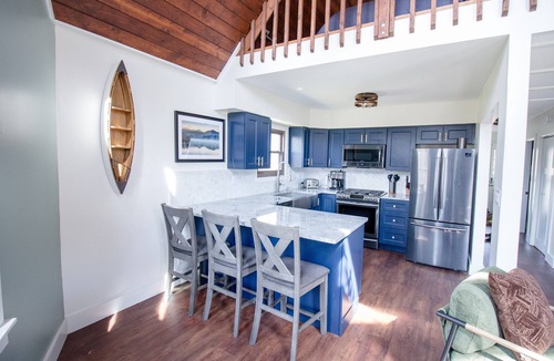 Reed City Ski Chalet | Riverfront | Hot Tub, Fireplace, Kayaks & Tubes