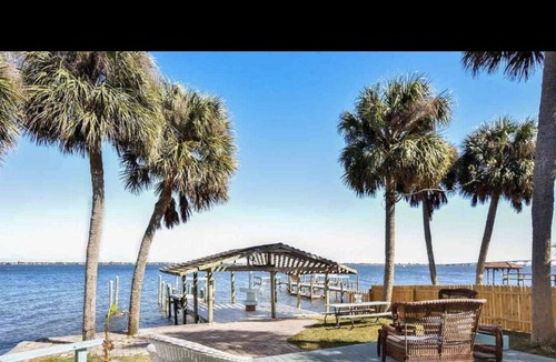 Tropic House | Riverfront House with Private Backyard and Dock- Pets stay FREE