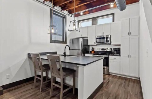 Downtown St. Louis Apartment | Riverfront Loft - Private Balcony - King Bed - Arch, Conventions & Casino