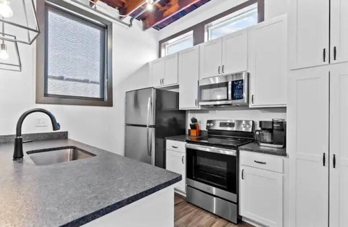 Downtown St. Louis Apartment | Riverfront Loft - Private Balcony - King Bed - Arch, Conventions & Casino