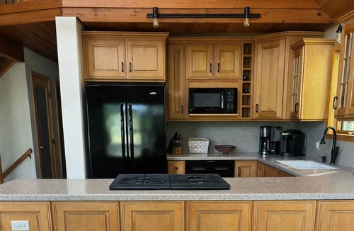 Coloma Cabin | Riverfront Log Cabin Near St Joe & South Haven