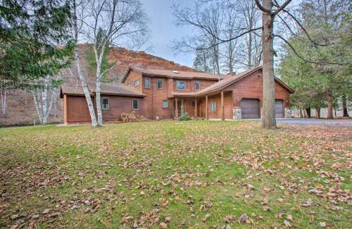 Manton House | Riverfront Manton Cabin with Pool Table and Fire Pit!