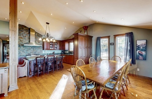 Wasaga Beach House | Riverfront retreat with seasonal heated pool, beach access, jetted tub & firepit
