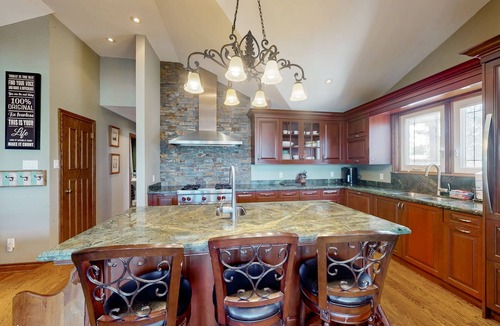 Wasaga Beach House | Riverfront retreat with seasonal heated pool, beach access, jetted tub & firepit
