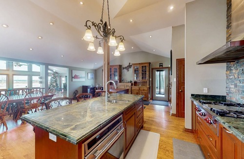 Wasaga Beach House | Riverfront retreat with seasonal heated pool, beach access, jetted tub & firepit