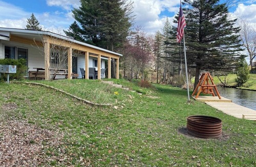 Grayling House | Riverfront Retreat in Grayling