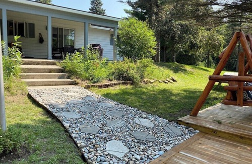 Grayling House | Riverfront Retreat in Grayling