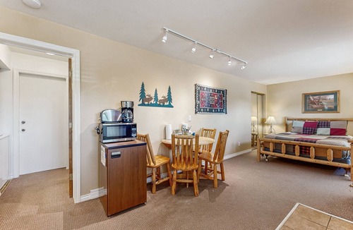 Grand Lake Condo | Riverfront retreat with a kitchenette, washer/dryer, & shared patio