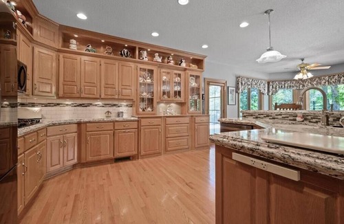 Oak Grove House | Riverfront vacation home with 2 full kitchens, a fitness center and sauna