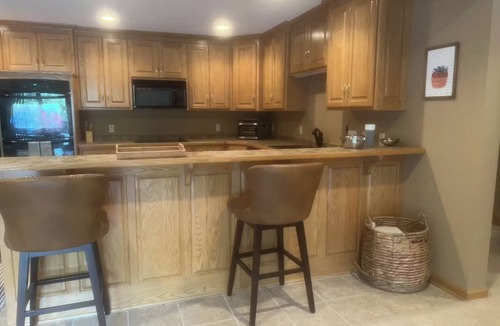 Oak Grove House | Riverfront vacation home with 2 full kitchens, a fitness center and sauna