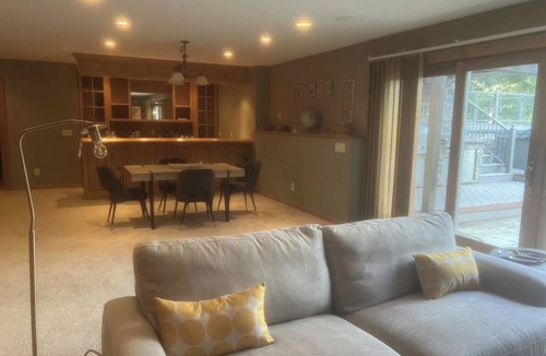 Oak Grove House | Riverfront vacation home with 2 full kitchens, a fitness center and sauna