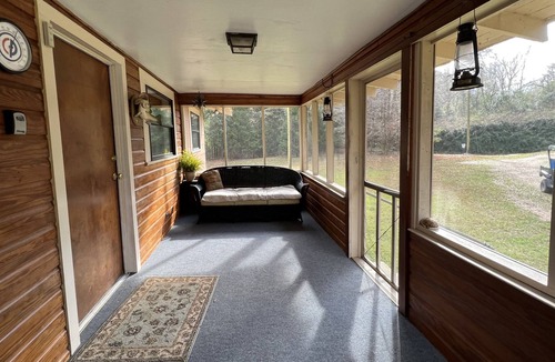 McComb House | “River’s Edge”, a secluded river- front, 2 bed 2 bath cottage in bamboo forest.