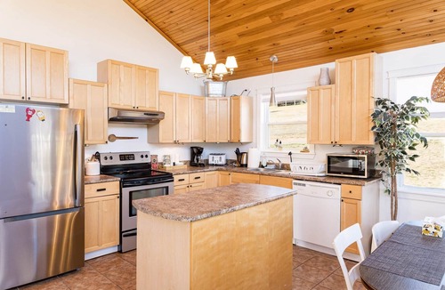 Found Mills House | Riverside Summer Retreat on PEI with Hot Tub, Deck, Kayaks & Pet-Friendly Stay