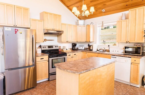 Found Mills House | Riverside Summer Retreat on PEI with Hot Tub, Deck, Kayaks & Pet-Friendly Stay