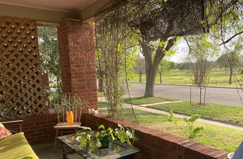Wichita House | Riverside Cottage With A Sunset View