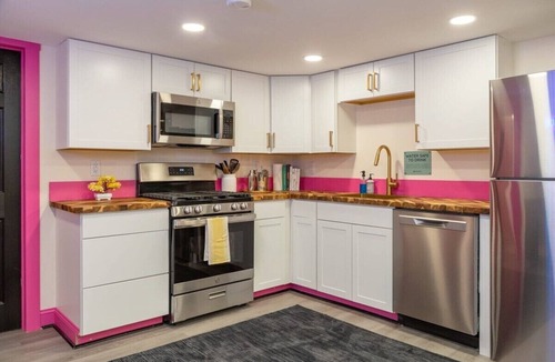 Jeffersonville Apartment | Riverside Fun Retreat w/Saunas Hot Tub & Arcade Next to Smugglers’ Notch Resort