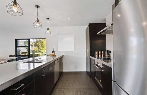 Rangatira Park House | Riverside in gated community