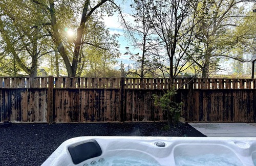 Kensington House | Riverside Retreat with Hot Tub