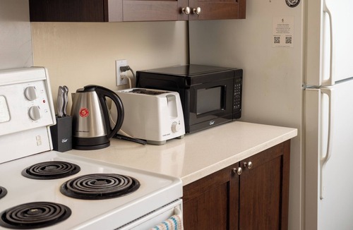 East Village Condo | Riverwalk Nest 5 M to Studio Bell + BathTub -W/D