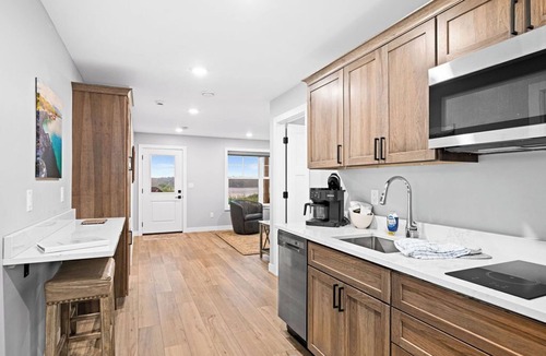 Riverside Apartment | RiverWest Trails End Chalet -River Front - Dog Friendly