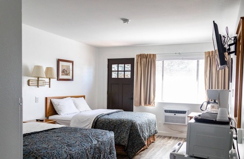 Delta House | Riverwood Inn Hotel Premiere Double Queen Suite