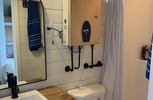 Flat Rock Cottage | Robin's Roost- Tiny house with a hot tub and bluff views