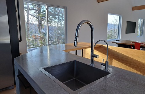 Harrington Ski Chalet | Rock House -Beautiful Architecture in the trees nestled between two lakes
