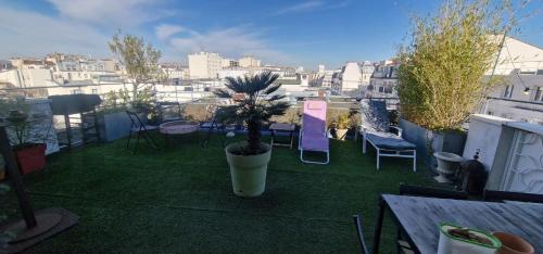 Quartier de la Chapelle Apartment | Romantic apartment with a view of the Sacré-Cœur