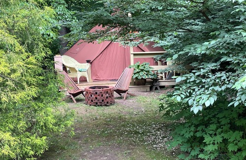 Southbury RV Rental | Romantic Botanical Glamping with pool, gardens & smoked dinner for 2 available.